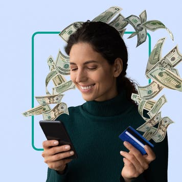 design image of a woman smiling at her phone and holding a credit card with money in the air