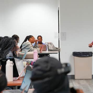 Ranyah Bullock, a senior at Delaware State University, speaks to students.