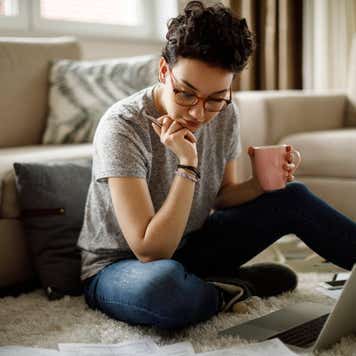 Young woman working at home
