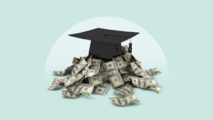 Image of a pile of money with a graduation cap sitting on top of it.